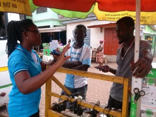 Student Joyce evangelizing people at the market