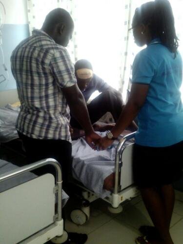 Student praying for the sick at the hospital (3)