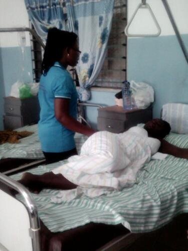 Student praying for the sick at the hospital (7)