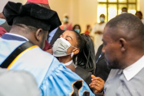 Decorating Pastor Regina with the Clerical Collar